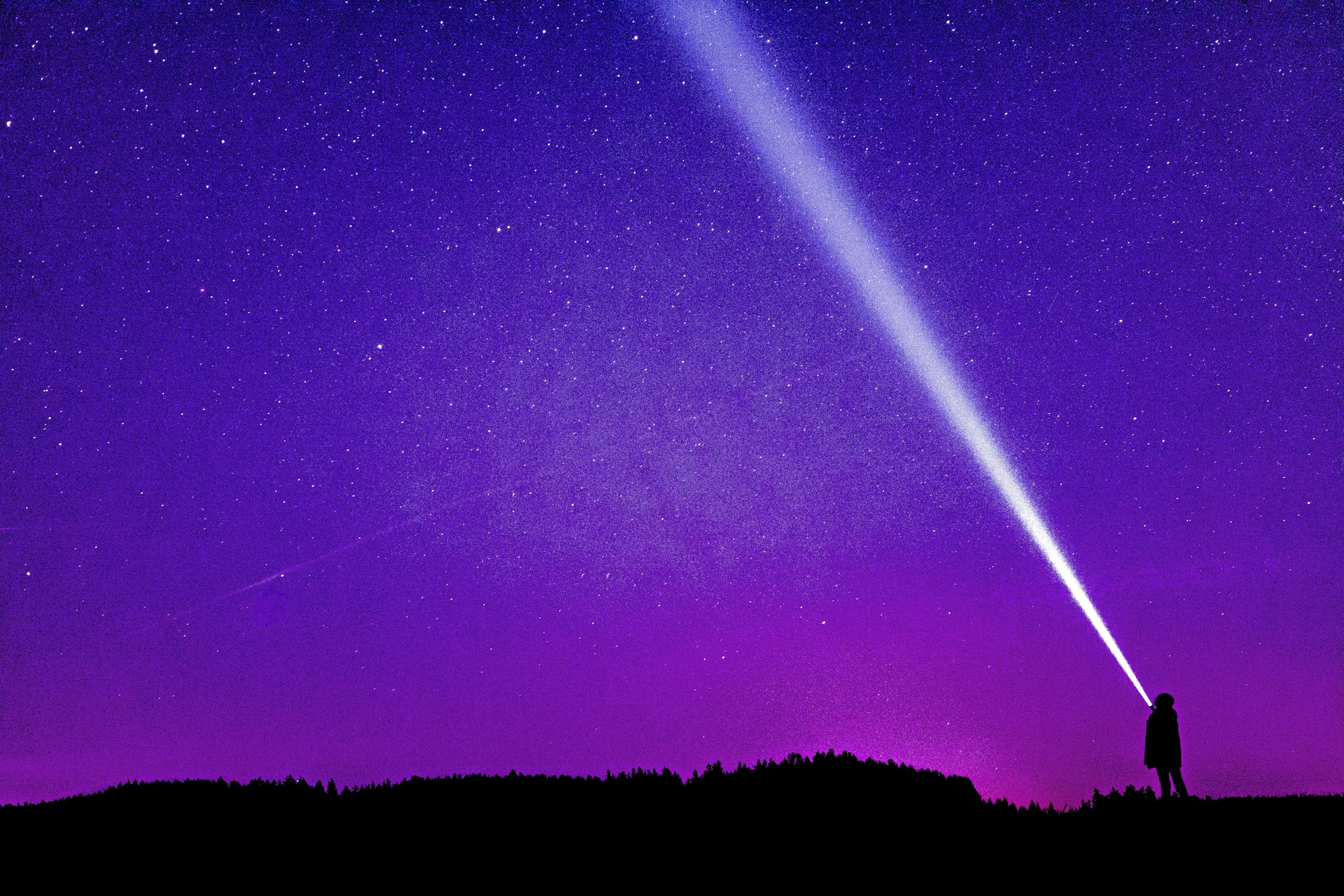 Silhouette of Person Under Blue and Purple Sky