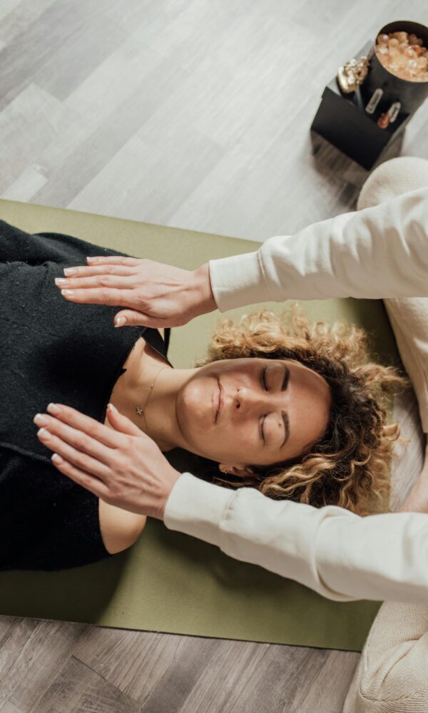 Woman Lying on the Floor Having Therapy